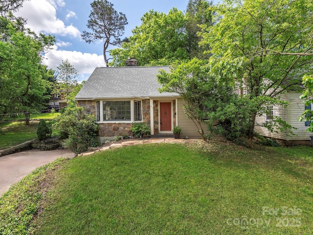 21 Clairmont Ave, Asheville, NC 28804 - view of front of property featuring stone siding, a front lawn, and a chimney