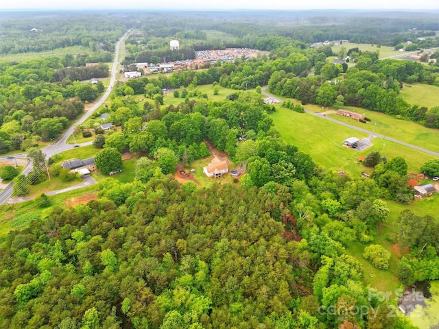aerial view with a wooded view