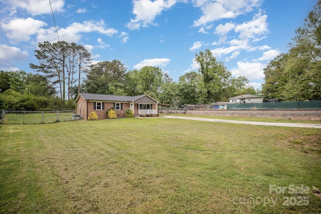 1211 Mirror Park Dr, Salisbury, NC 28146 - single story home featuring a front yard, a fenced backyard, driveway, brick siding, and a swimming pool