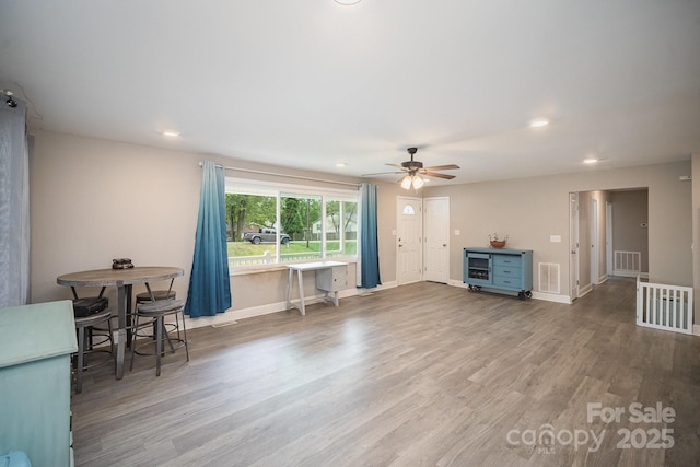 1211 Mirror Park Dr, Salisbury, NC 28146 - living area featuring baseboards, visible vents, wood finished floors, and ceiling fan