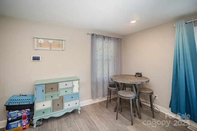 1211 Mirror Park Dr, Salisbury, NC 28146 - recreation room with baseboards, visible vents, and wood finished floors