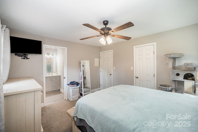 1211 Mirror Park Dr, Salisbury, NC 28146 - bedroom featuring a ceiling fan, ensuite bath, and light colored carpet