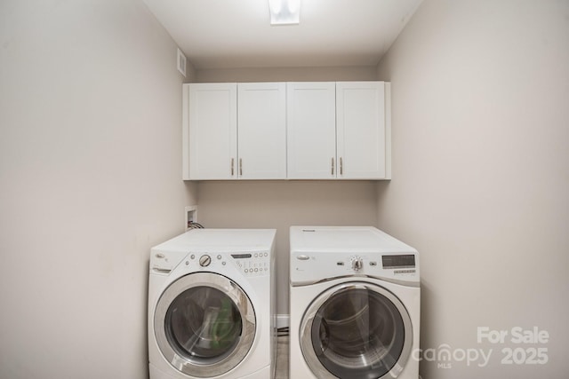 1211 Mirror Park Dr, Salisbury, NC 28146 - washroom with visible vents, separate washer and dryer, and cabinet space