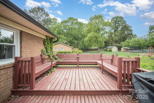 1211 Mirror Park Dr, Salisbury, NC 28146 - deck featuring fence, an outdoor structure, a yard, and a shed