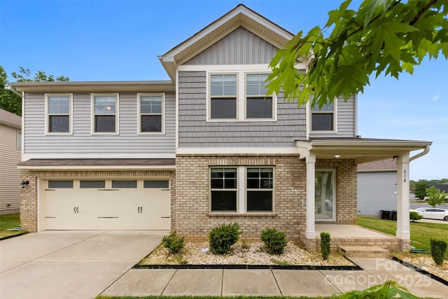 view of front of house featuring brick siding, concrete driveway, and an attached garage