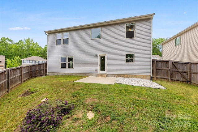 back of house with a patio area