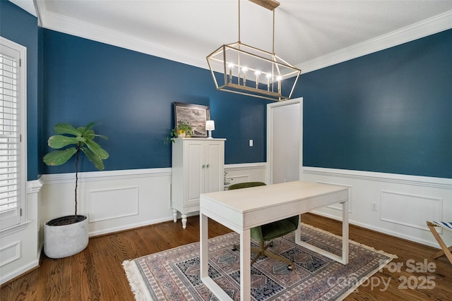 office area featuring crown molding, a wainscoted wall, and a notable chandelier