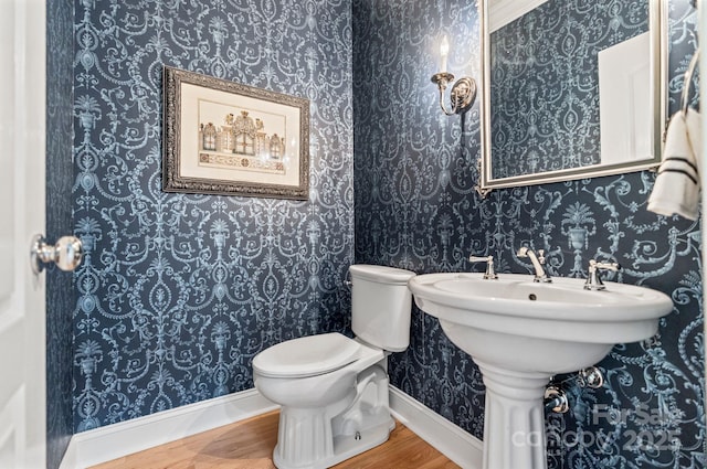 1721 White Pond Ln, Waxhaw, NC 28173 - bathroom with wood finished floors, toilet, and baseboards