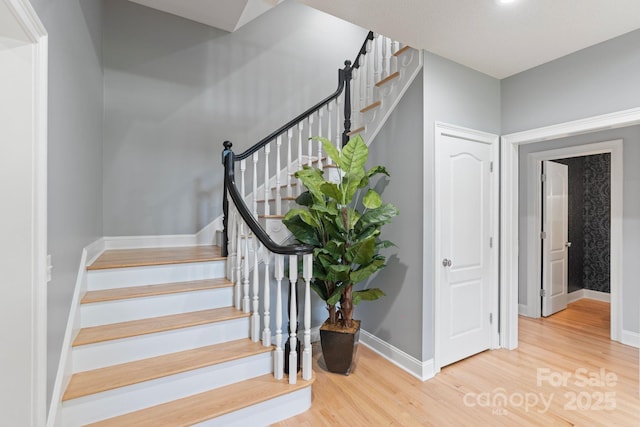 1721 White Pond Ln, Waxhaw, NC 28173 - stairway with wood finished floors and baseboards