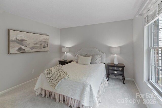 1721 White Pond Ln, Waxhaw, NC 28173 - carpeted bedroom with baseboards