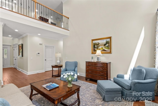 7923 Mountain Shore Dr, Sherrills Ford, NC 28673 - living room with wood finished floors, crown molding, baseboards, a towering ceiling, and recessed lighting