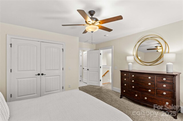 7923 Mountain Shore Dr, Sherrills Ford, NC 28673 - carpeted bedroom featuring a closet, baseboards, and a ceiling fan