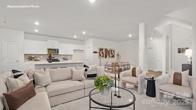 living room featuring recessed lighting