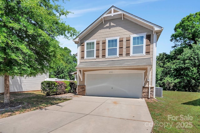 view of front facade with an attached garage, driveway, stone siding, and a front lawn