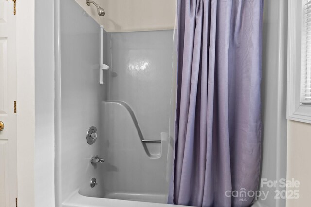 full bath featuring shower / tub combo