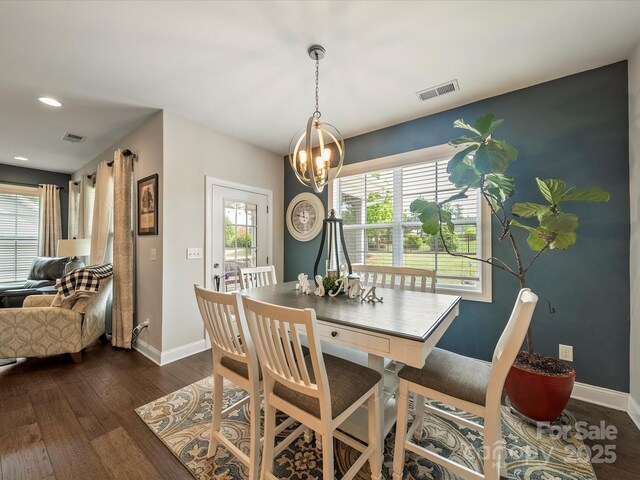 1149 Mayapple Way, Belmont, NC 28012 - dining room with a chandelier, baseboards, visible vents, and dark wood-style flooring