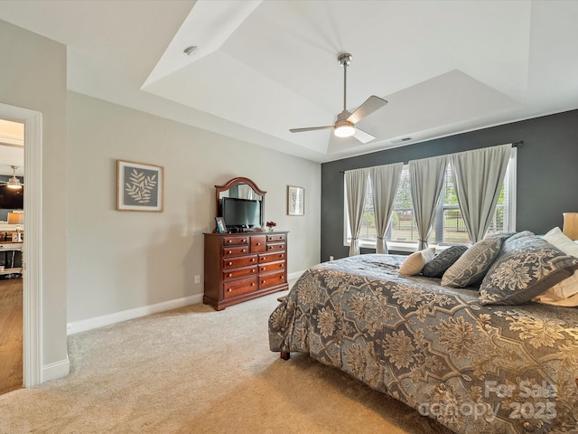 1149 Mayapple Way, Belmont, NC 28012 - bedroom with carpet flooring, a raised ceiling, visible vents, baseboards, and a ceiling fan