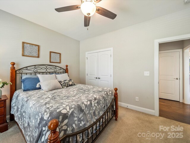 1149 Mayapple Way, Belmont, NC 28012 - carpeted bedroom featuring a closet, ceiling fan, and baseboards