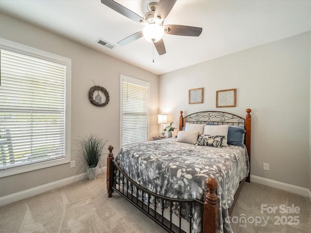 1149 Mayapple Way, Belmont, NC 28012 - carpeted bedroom with baseboards, visible vents, and ceiling fan