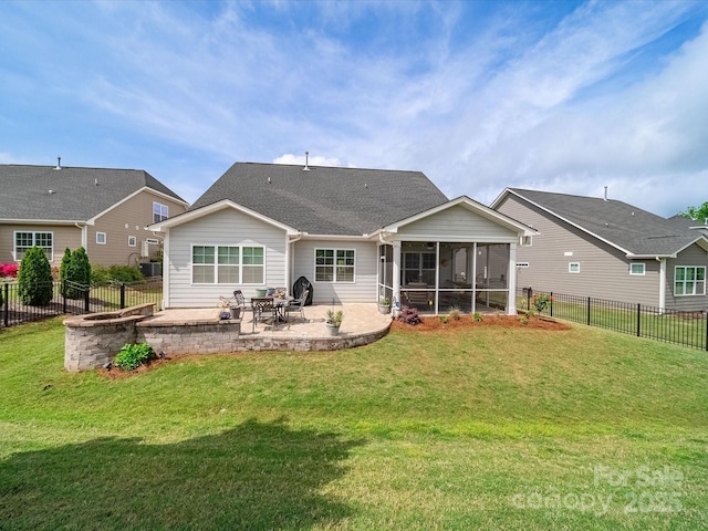 1149 Mayapple Way, Belmont, NC 28012 - rear view of house with a lawn, a patio area, a fenced backyard, and a sunroom