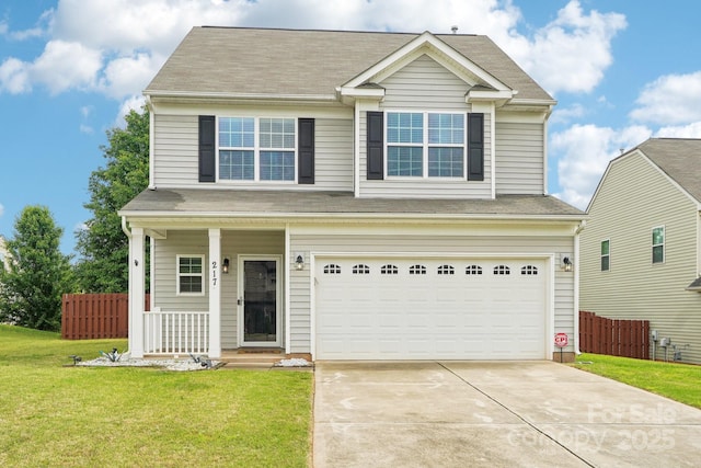 view of front facade featuring fence, driveway, a front yard, and a garage