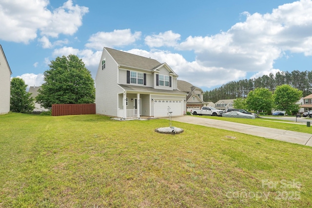 traditional home with a porch, a front yard, a garage, concrete driveway, and fence