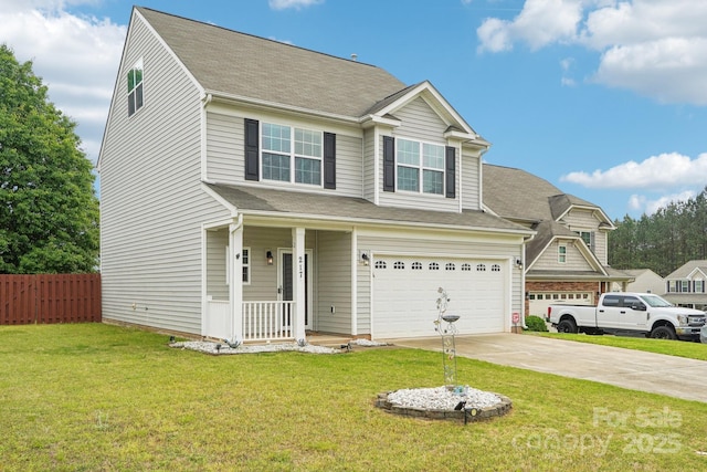 view of front of house with a porch, a front yard, a garage, driveway, and fence
