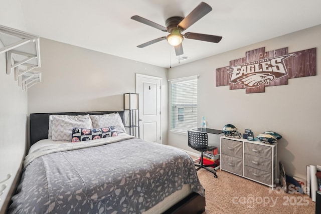carpeted bedroom with visible vents and ceiling fan