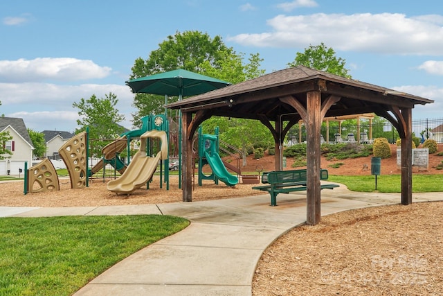 community playground featuring fence and a gazebo