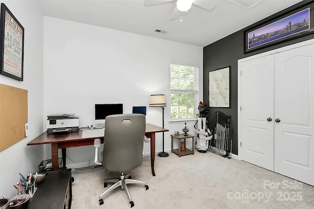 home office featuring visible vents, carpet flooring, and ceiling fan