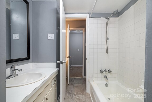 bathroom with vanity and shower / bathtub combination