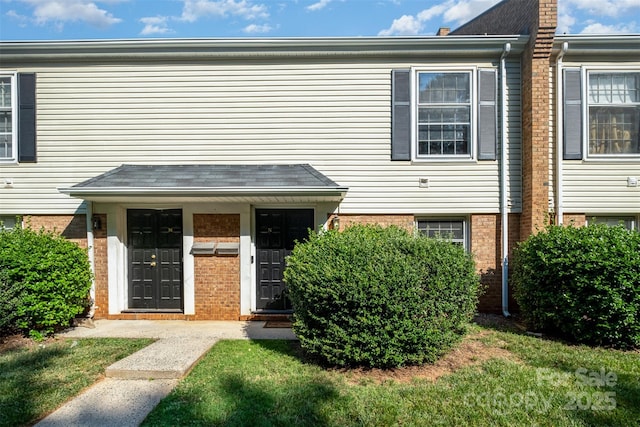4609 Coronado Dr Unit N, Charlotte, NC 28212 - townhome / multi-family property with brick siding and a front yard
