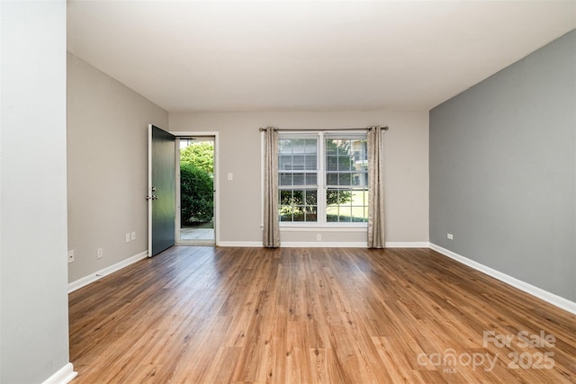4609 Coronado Dr Unit N, Charlotte, NC 28212 - unfurnished room with wood finished floors and baseboards