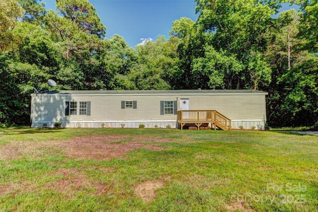 view of front of home with a front yard