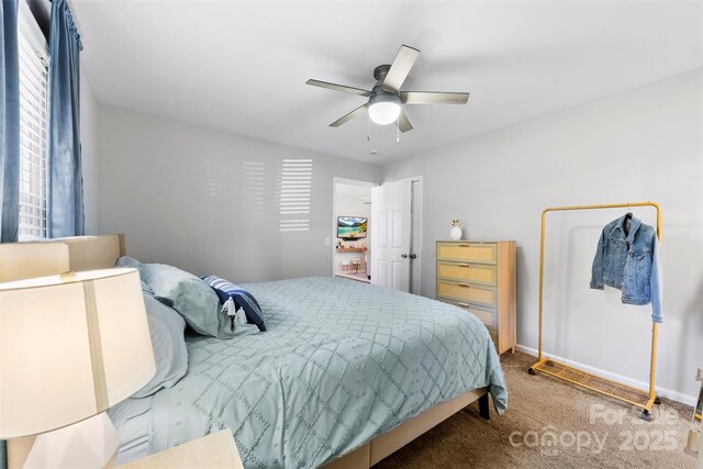 carpeted bedroom with baseboards and ceiling fan