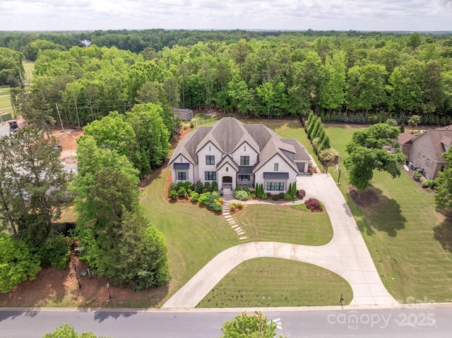drone / aerial view with a forest view
