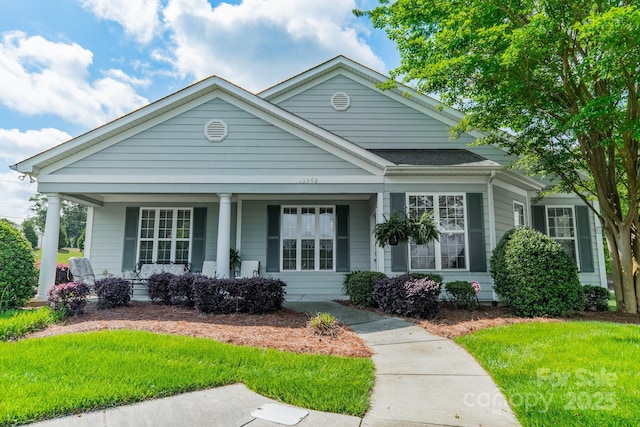13360 Old Compton Ct, Pineville, NC 28134 - greek revival inspired property with a porch and a front yard