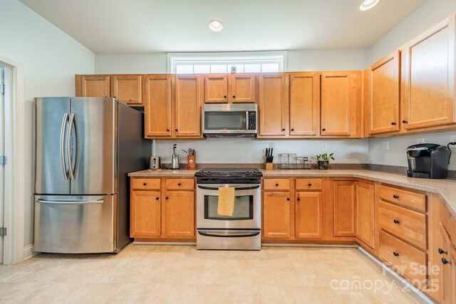 13360 Old Compton Ct, Pineville, NC 28134 - kitchen with recessed lighting, stainless steel appliances, and light countertops
