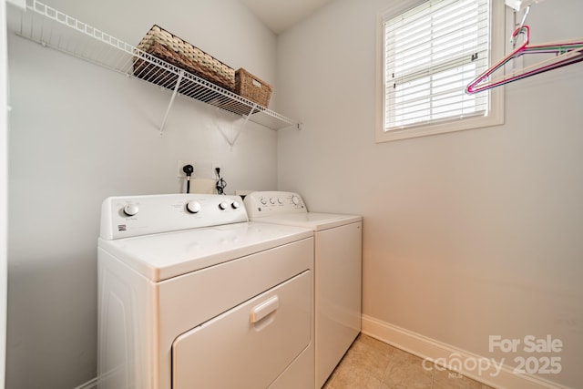 13360 Old Compton Ct, Pineville, NC 28134 - laundry room with light tile patterned floors, washing machine and dryer, laundry area, and baseboards