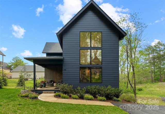 110 Timberview Dr, Swannanoa, NC 28778 - rear view of house with a lawn