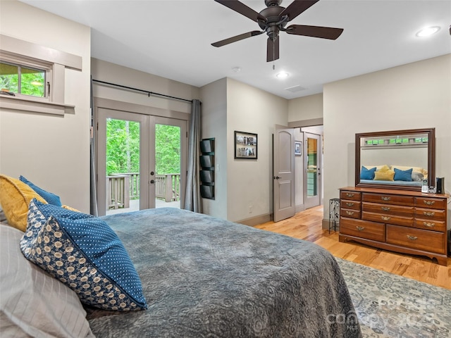 29 Ravenna St, Asheville, NC 28803 - bedroom with access to exterior, wood finished floors, french doors, recessed lighting, and baseboards