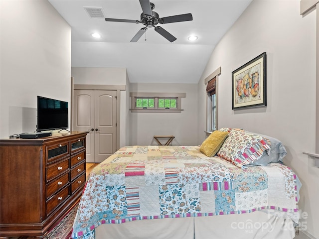 29 Ravenna St, Asheville, NC 28803 - bedroom featuring a closet, vaulted ceiling, a ceiling fan, recessed lighting, and wood finished floors