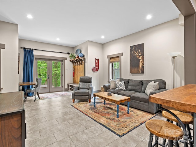 29 Ravenna St, Asheville, NC 28803 - living area featuring healthy amount of natural light, recessed lighting, french doors, and light tile patterned floors