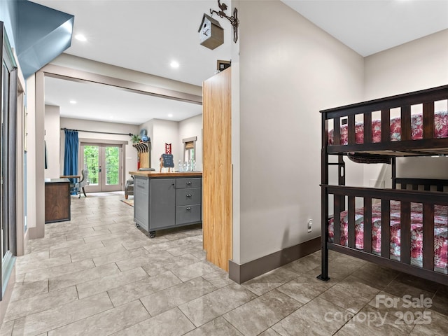 29 Ravenna St, Asheville, NC 28803 - bedroom featuring french doors, baseboards, and recessed lighting