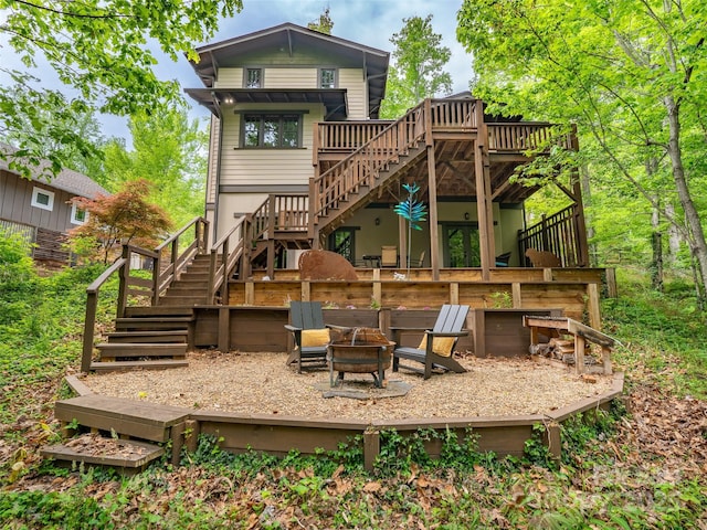 29 Ravenna St, Asheville, NC 28803 - rear view of property with stairway, an outdoor fire pit, and a wooden deck