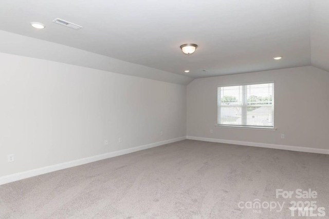 1479 Mocksville Hwy Unit 23, Statesville, NC 28625 - carpeted spare room featuring lofted ceiling, recessed lighting, and baseboards