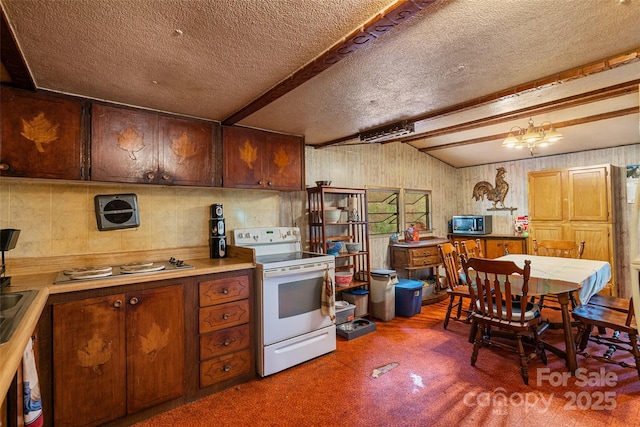 68 Upper White Oak Rd, Mars Hill, NC 28754 - kitchen featuring electric stove, a textured ceiling, stainless steel microwave, beam ceiling, and light countertops