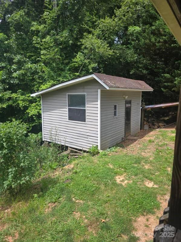 68 Upper White Oak Rd, Mars Hill, NC 28754 - view of outdoor structure with a wooded view