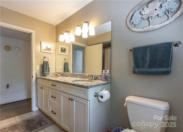 597 Sweetwater Rdg, Burnsville, NC 28714 - full bath featuring double vanity and tile patterned floors