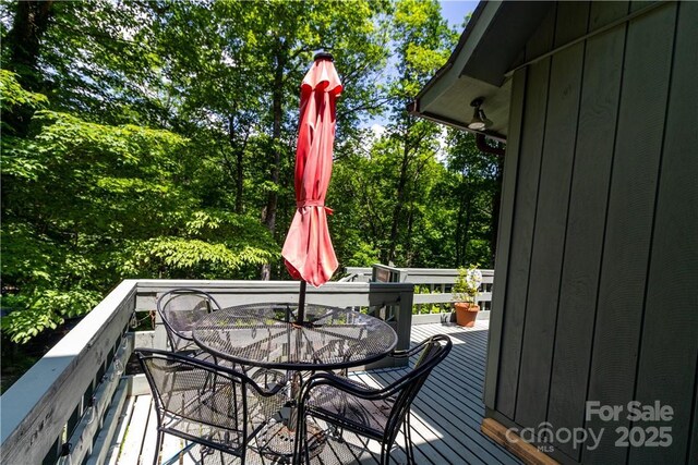 597 Sweetwater Rdg, Burnsville, NC 28714 - wooden deck featuring outdoor dining area